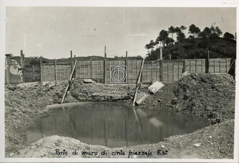 Parte di muro di cinta piazzale Est